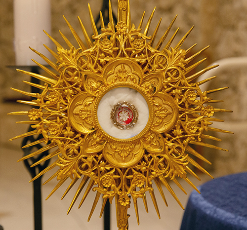 A first-class relic of St. Carlo Acutis, a strand of hair, is displayed during a holy hour with high school students from the Archdiocese of Miami at St. David Church in Davie, Oct. 10, 2025.