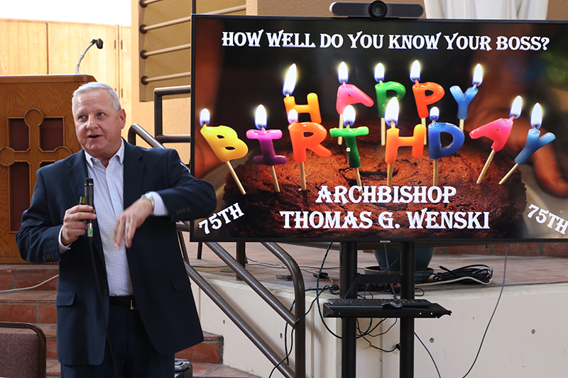 Michael Casciato, archdiocesan chief financial officer, leads a game of trivia during Archbishop Thomas Wenski’s 75th birthday party Oct. 20, 2025, at the Archdiocese of Miami Pastoral Center in Miami Shores.