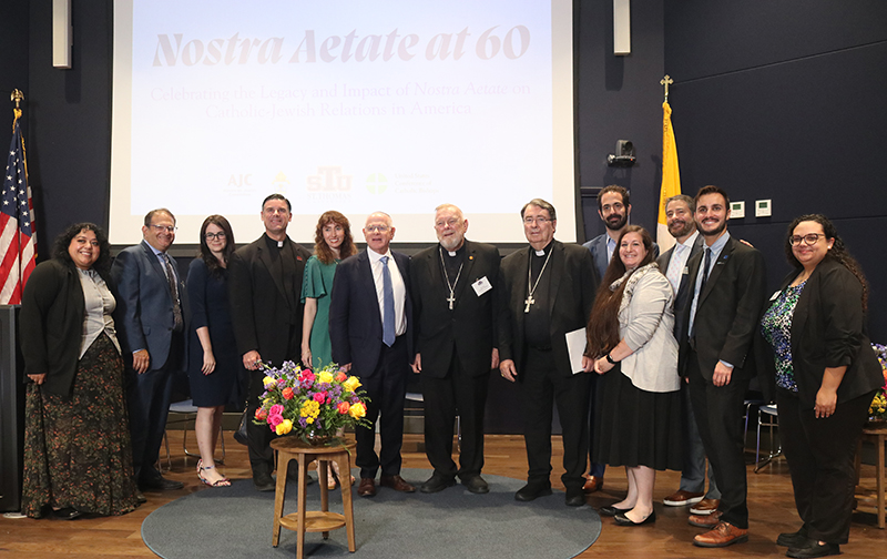 Jewish and Catholic participants pose together during the commemoration of the 60th anniversary of Nostra Aetate at St. Thomas University in Miami Gardens Oct. 20, 2025.