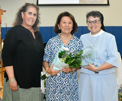 Ana Chao (center) poses with Gloria Ramos, vice principal for academics at Lourdes Academy (left), and Sister Carmen Fernandez, president of Lourdes, after receiving a Legacy of Lourdes Award presented at Our Lady of Lourdes Academy, Miami, on Oct. 5, 2025.