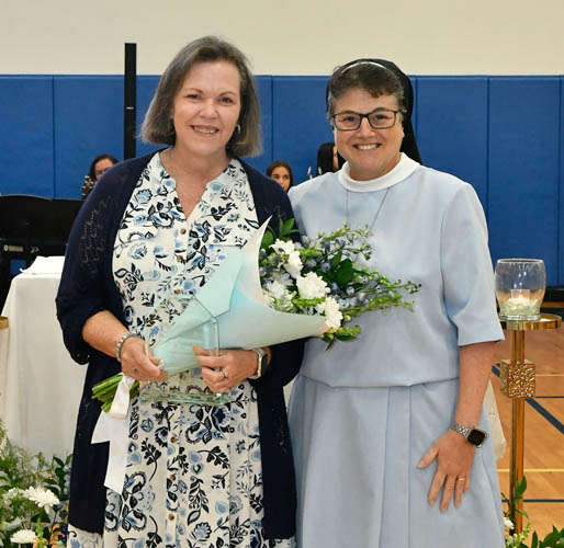 Susan Fleming poses with Sister Carmen Fernandez, president of Lourdes Academy, after receiving a Legacy of Lourdes Award presented at Our Lady of Lourdes Academy, Miami, on Oct. 5, 2025.