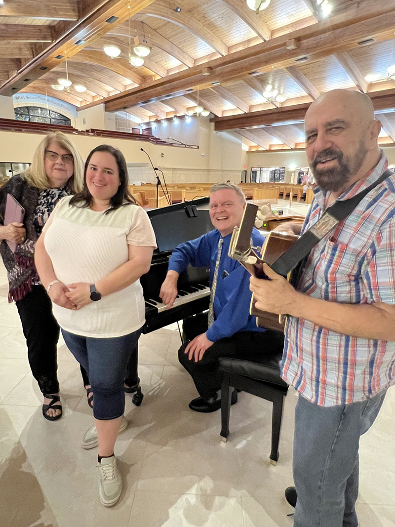 In this October 2024 file photo, Wesley B. Wright, a former guitarist for Miami Sound Machine, is pictured here with members of the St. Gregory music ministry, including, Grace Jueneman, left, Andrea Heighes, and Michael Sayers, director of the music  ministry.