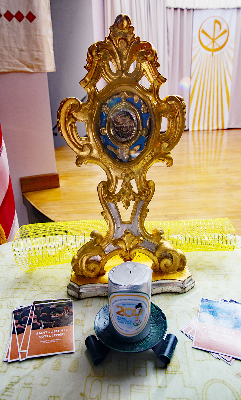 A relic of St. Joseph Benedict Cottolengo, a bone, is displayed during the 62nd anniversary Mass of the Marian Center in Miami, celebrated by Archbishop Thomas Wenski Oct. 21, 2025.