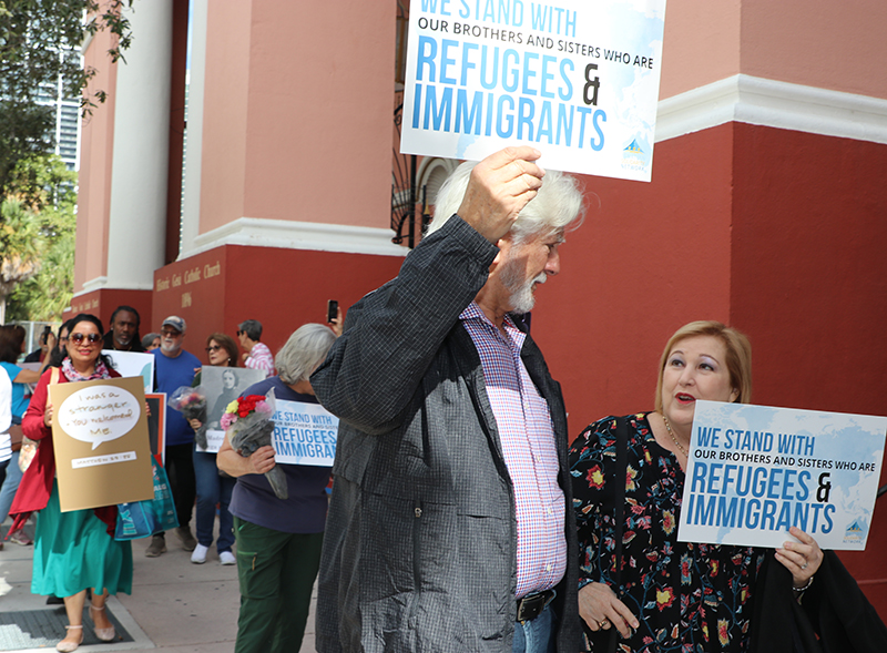 Parishioners from different archdiocesan parishes and lay organizations in Miami participate in a march in support of immigrants after Mass at Gesu Church in downtown Miami Nov. 13, 2025.
