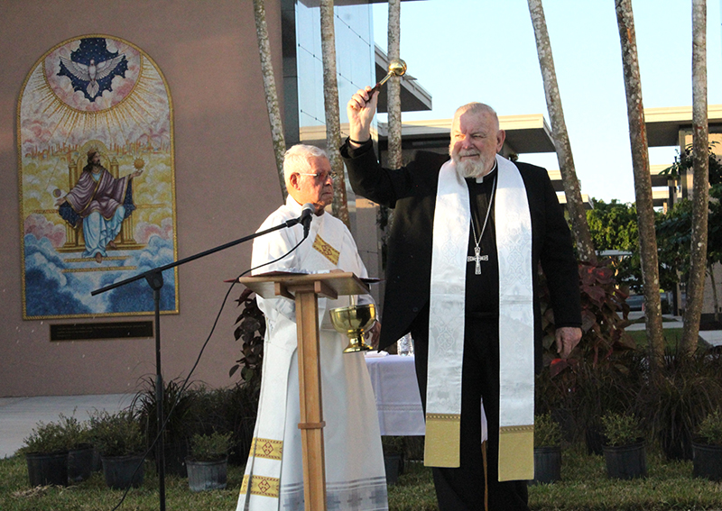 Archbishop Thomas Wenski blesses the completed Resurrection Mausoleum Complex at Our Lady of Mercy Catholic Cemetery in Doral Nov. 14, 2025. He is accompanied by Deacon Fernando Bestard, a former chaplain of Our Lady of Mercy Cemetery.