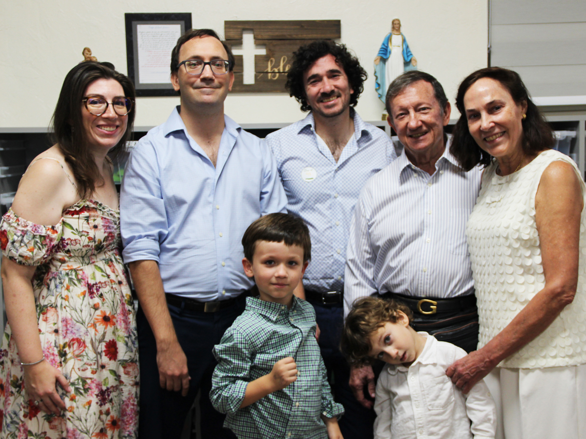 The Mario Pino STREAM Laboratory at St. Theresa Catholic School was funded by the family of the late alumnus. The family members are pictured at the ribbon-cutting ceremony Nov. 16, 2025. In the back row, from left: Melanie Wahl; Joseph S. Pino; Bernard “Benny” John Pino III; Bernard “Ben” John Pino Jr.; and Maria Garcia-Otero. Front row: Sebastian and Griffin Pino, who attend St. Theresa School.