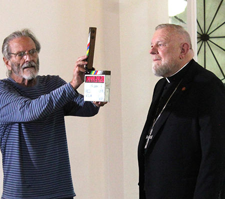 Archbishop Thomas Wenski prepares for his take during the 2026 Archbishop's Charities and Development Drive (ABCD) campaign video, filmed on Aug. 29, 2025. The video will be shown at all parishes of the Archdiocese of Miami for ABCD Commitment Weekend, Jan. 24 -25, 2026.