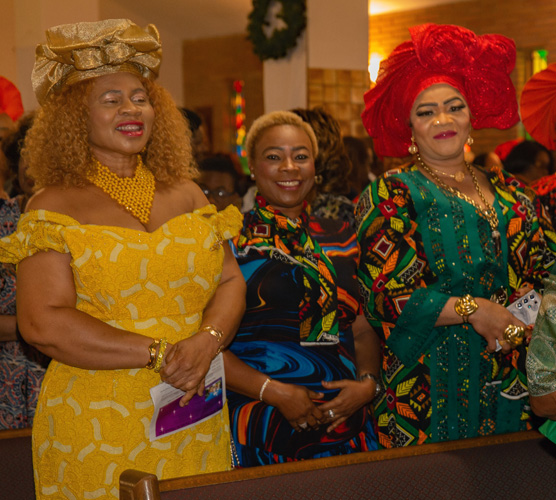 Nigerian ministry members stand during the 75th anniversary Mass of Holy Redeemer Church in Miami celebrated by Archbishop Thomas Wenski on Dec. 14, 2025. On the occasion, Father Emmanuel Essiet was installed as pastor.