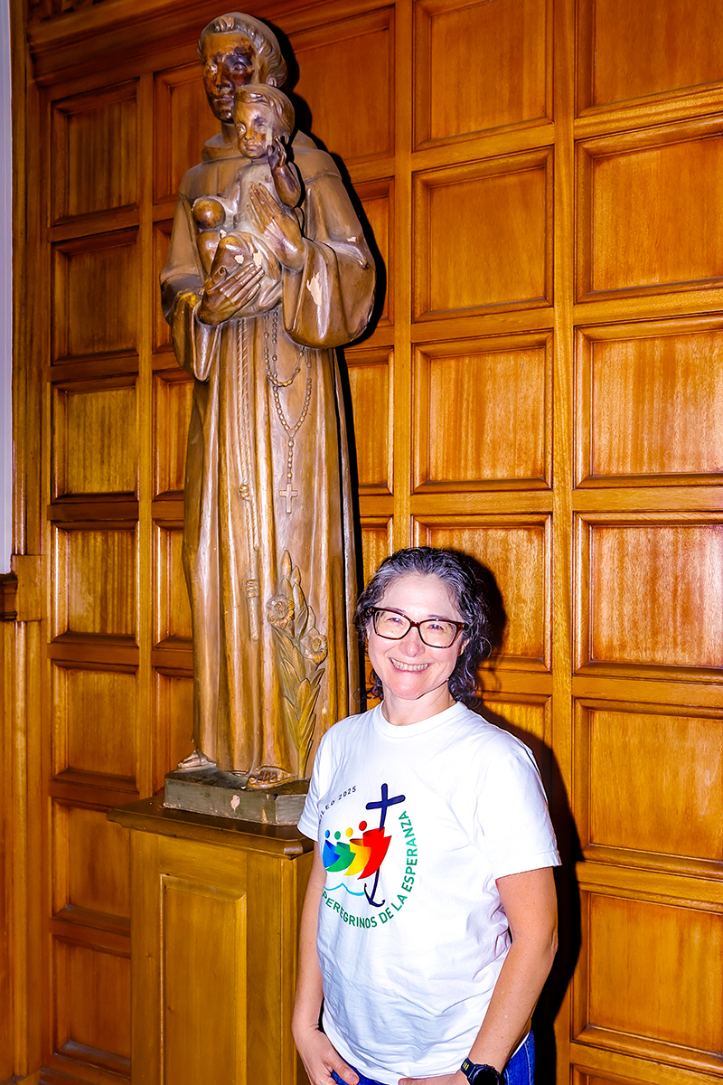 Ivonne Stoner, a parishioner of St. Bonaventure Parish in Davie, poses wearing a Jubilee of Hope T-shirt after the closing Mass of the 2025 Jubilee Year at St. Mary Cathedral Dec. 27, 2025.