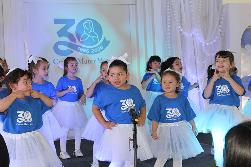 Children from Centro Mater West Child Care Center in Hialeah Gardens sing and dance during their school's 30th anniversary celebration on January 14, 2026.