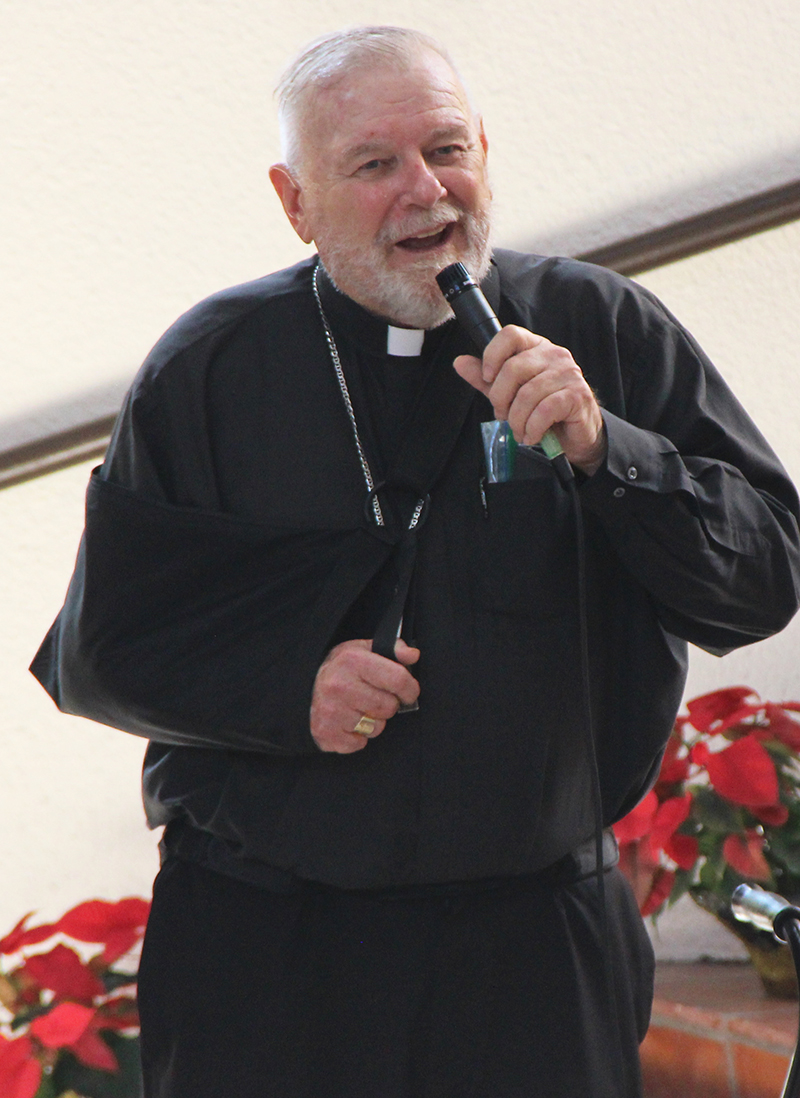 Archbishop Thomas Wenski speaks at Sister Elizabeth Worley’s 80th birthday party on January 23 at the Archdiocese of Miami Pastoral Center in Miami Shores. Sister Worley is the archdiocesan chancellor for administration and chief operating officer.