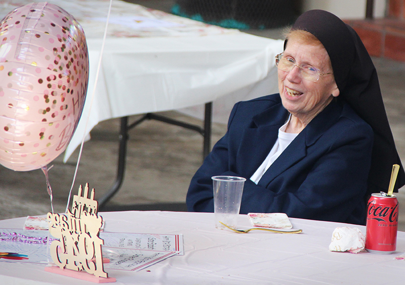 Sister Elizabeth Worley, Archdiocese of Miami chancellor for administration and chief operating officer, enjoys her 80th birthday party on January 23 at the Pastoral Center in Miami Shores.