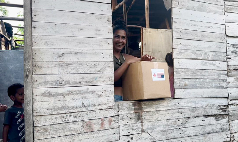 A Cuban woman receives humanitarian aid in Santiago de Cuba, part of the aid sent by the U.S. government to the island in the wake of Hurricane Melissa. The aid was delivered on Jan. 28, 2026, in collaboration with Churches in Miami and Cuba.