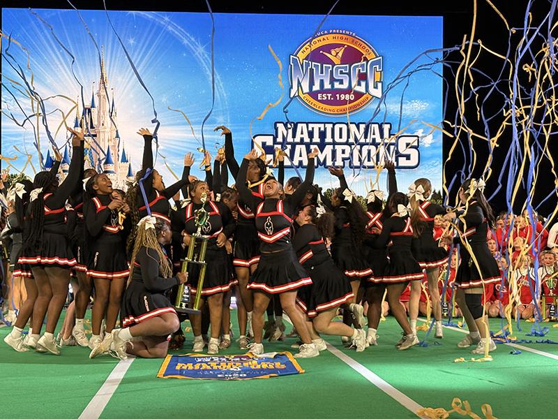 The Monsignor Edward Pace High School Cheerleading Team celebrates their national and world championship titles during the World Championships that took place Feb. 1 at the ESPN Wide World of Sports in Orlando, Florida.