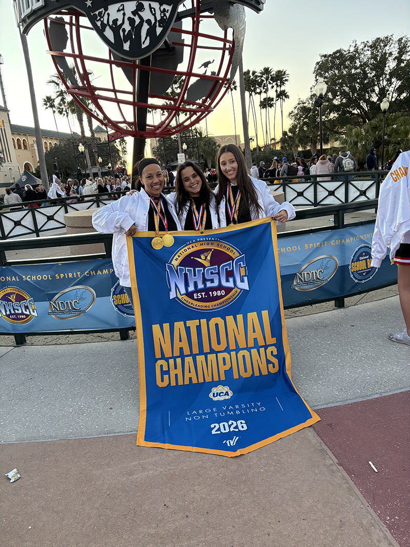 Monsignor Edward Pace High School Cheerleading Head Coach Surella Rodriguez and Assistant Coaches Jasmine Mas  and Lisa Mason celebrate the national and world championship titles.