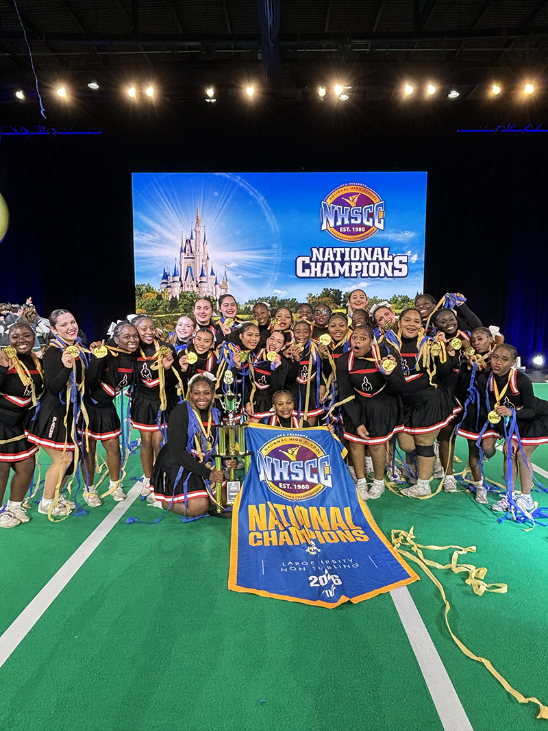 The Monsignor Edward Pace High School Cheerleading Team celebrates their national and world championship titles during the World Championships that took place Feb. 1 at the ESPN Wide World of Sports in Orlando, Florida.