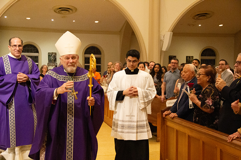 Archbishop Thomas Wenski, second from left, blesses couples at the close of the Archdiocese of Miami Wedding Anniversary Mass at the Cathedral of St. Mary Feb. 21, 2026.