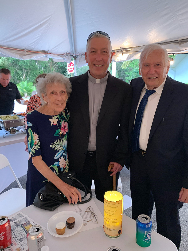 Father John Peloso is pictured with his parents, Margaret and John Peloso Sr.(both deceased), at an event held at St. Edward Parish in Pembroke Pines.
