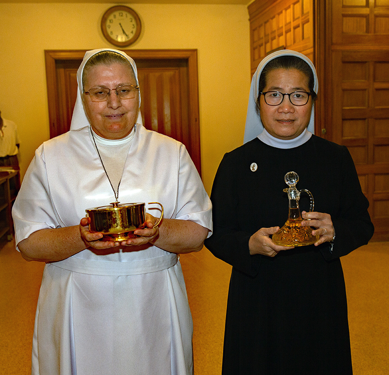 Sister Sadeh Abed Alnour, FMA, Salesian Sisters of St. John Bosco and Sister Therese Vu, Daughters of Our Lady of Visitation, 25 year honorees. Archbishop Thomas Wenski celebrated Mass for Archdiocese of Miami consecrated life members and four jubilarians Mar 8, 2026
