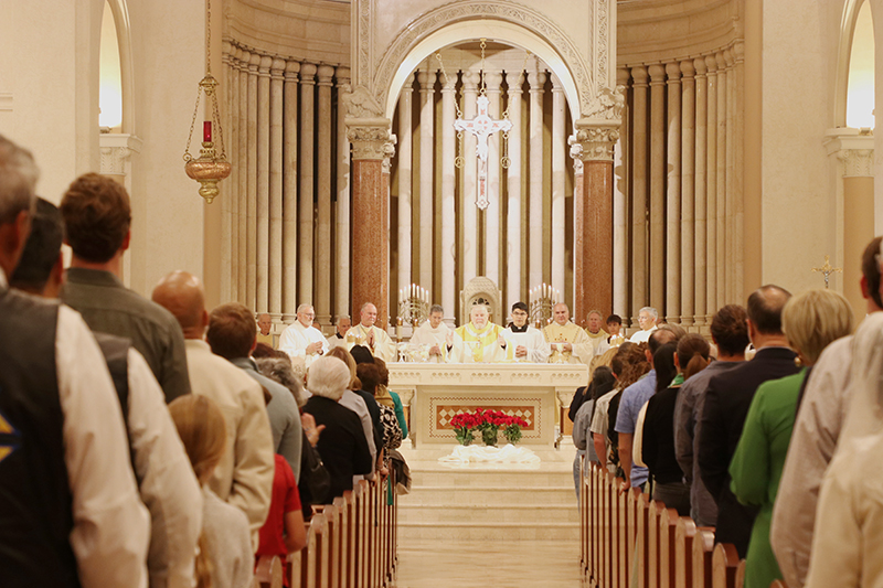 Archbishop Wenski celebrates the Mass commemorating the 100th anniversary of St. Patrick Parish in Miami Beach, March 17, 2026. Concelebrating with him are Father Roberto Cid, pastor of St. Patrick Church, and others archdiocesan priest.