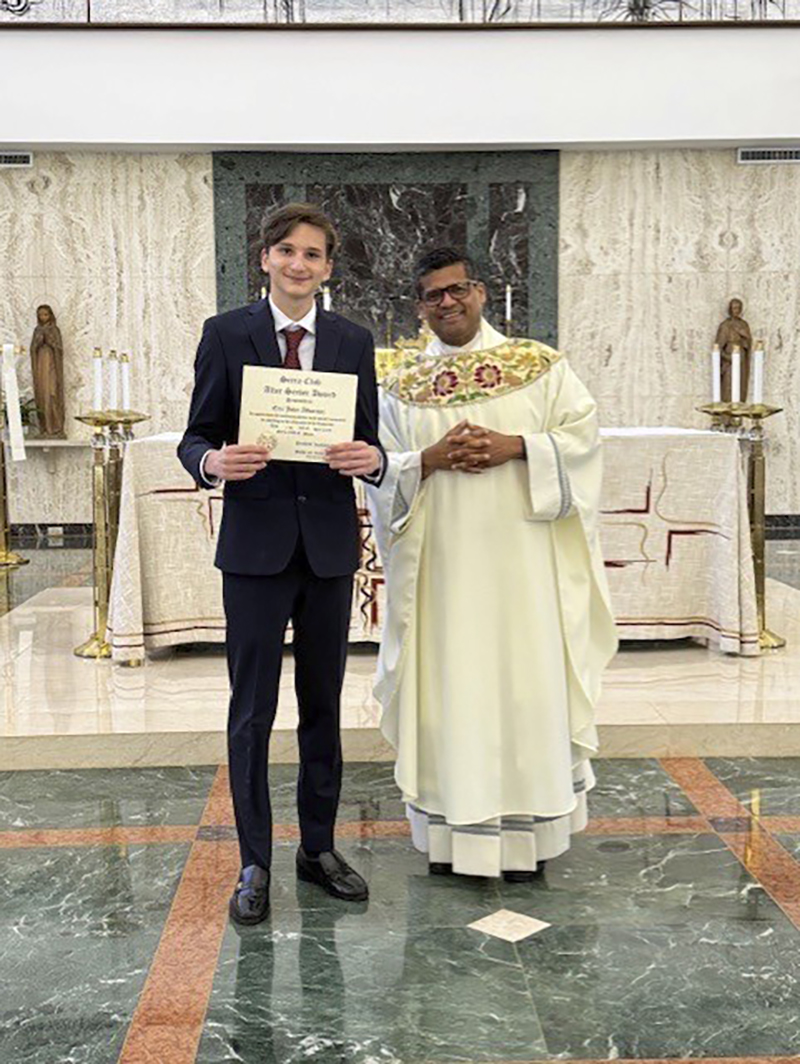 Eric John Albornoz poses with his certificate alongside Fr. Milton Martinez, Archdiocese of Miami vocations director and Serra Club chaplain. The Altar Servers Awards Mass was celebrated at St. John Vianney College Seminary in Miami on April 11, 2026.