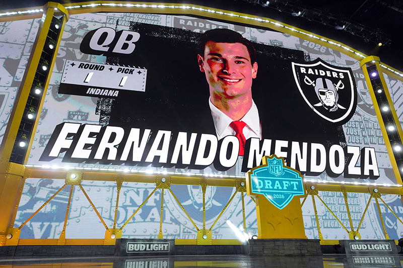 Former Indiana Hoosiers quarterback Fernando Mendoza is projected on the screen at the NFL draft in Pittsburgh from the Miami suburb of Coral Gables April 23, 2026. That evening he was selected by the Las Vegas Raiders as the No. 1 pick during the 2026 NFL draft at Pittsburgh's Acrisure Stadium. (OSV News photo/Mandatory Credit: Kirby Lee-Imagn Images via Reuters)