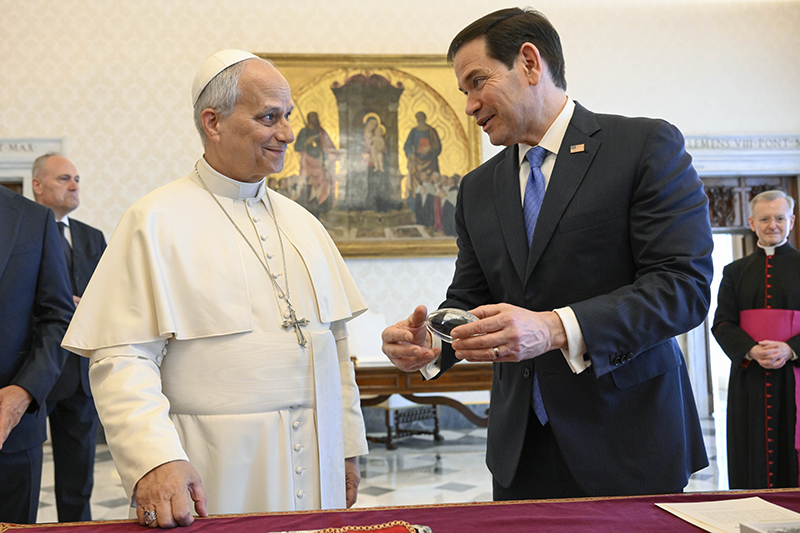 Pope Leo XIV and U.S. Secretary of State Marco Rubio smile during a private audience at the Vatican May 7, 2026. (OSV News photo/Simone Risoluti Vatican Media)
