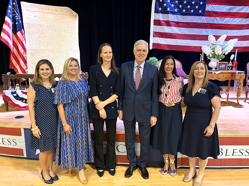 May 11, 2026PINECRESTU.S. Supreme Court Justice Neil Gorsuch and author Janie Nitze (center left) visited St. Louis Covenant School in Pinecrest, May 11, 2026 to present their new book "Heroes of 1776: The Story of the Declaration." They are photographed with St. Louis' administrators and faculty, (from left) Annie Baixauil, assistant principal; Julie Perdomo, principal; Christina Izquierdo, director of curriculum and instruction; and MaryLee Parker, social studies middle school teacher.