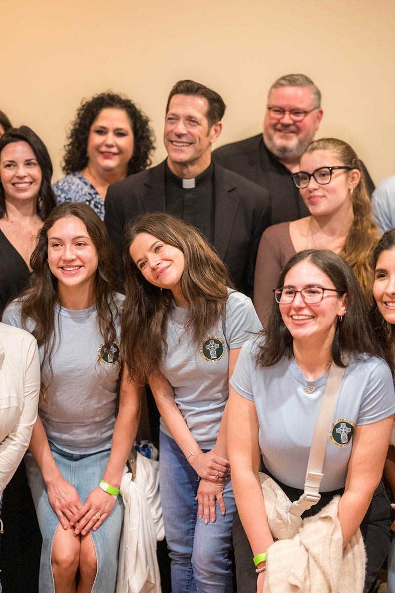 Father Mike Schmitz, a diocesan priest in the Diocese of Duluth, Minnesota, and a popular social media figure, meets with young adults from St. David Parish in Davie at the Broward Center for the Performing Arts in downtown Fort Lauderdale May 20, 2026. Fr. Schmitz spoke in three Florida cities in May as part of his Parables Tour.