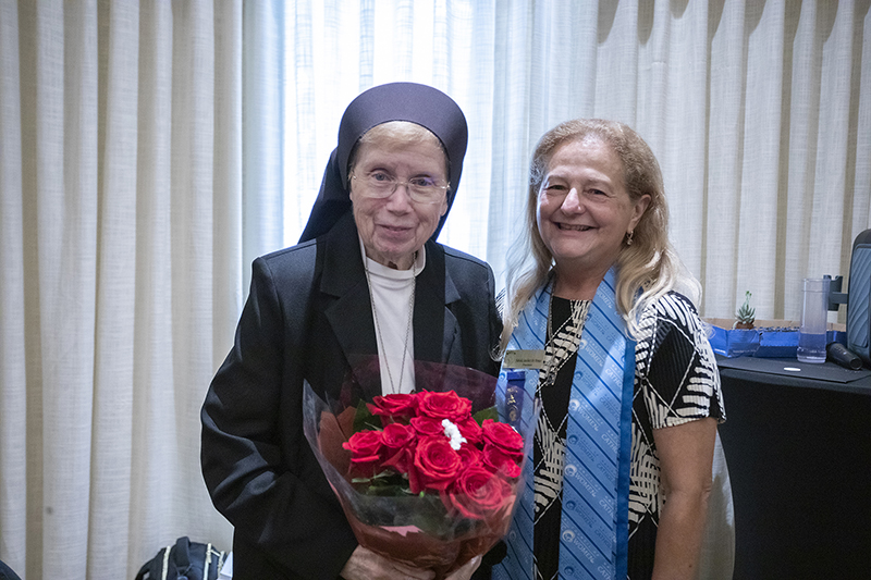 Sister Elizabeth Worley, left, poses with Fabiola Sanchez-De Armas, president of the Miami Archdiocesan Council of Catholic Women, during the organization's 68th Annual Convention in Miami. Sister Elizabeth was recognized for her years of dedicated service and commitment to the mission of the Miami Archdiocesan Council of Catholic Women.