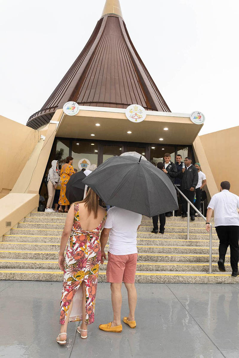 Pilgrims stand before the entrance of the National Shrine of Our Lady of Charity in Miami, affectionately known as La Ermita de La Caridad, for the annual feast of Our Lady of Charity Sept. 8, 2025.