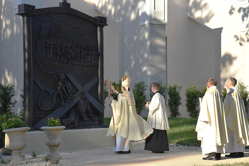 Cardinal Christophe Pierre blesses the nineth station – Jesus falls for a third time – in the Gospel Gardens at the Basilica of the National Shrine of Mary, Queen of the Universe. The bronze Stations of the Cross were created by world-reknown artist Timothy Schmalz and are possible thanks to the donation of Barbara Papitto. (GLENDA MEEKINS)