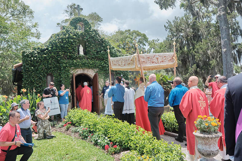 Bishop Erik T. Pohlmeier of St. Augustine, Fla., carries the monstrance in the historic Our Lady of La Leche Shrine during the kickoff of the 2026 National Eucharistic Pilgrimage in St. Augustine May 24. (OSV News photo/George Martell)