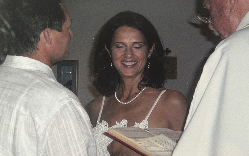 Monsignor John Glorie, far right, presides over the wedding of Douglas Reeves and Maria Lima in Lauderadale-By-The-Sea, Florida in May 2011.