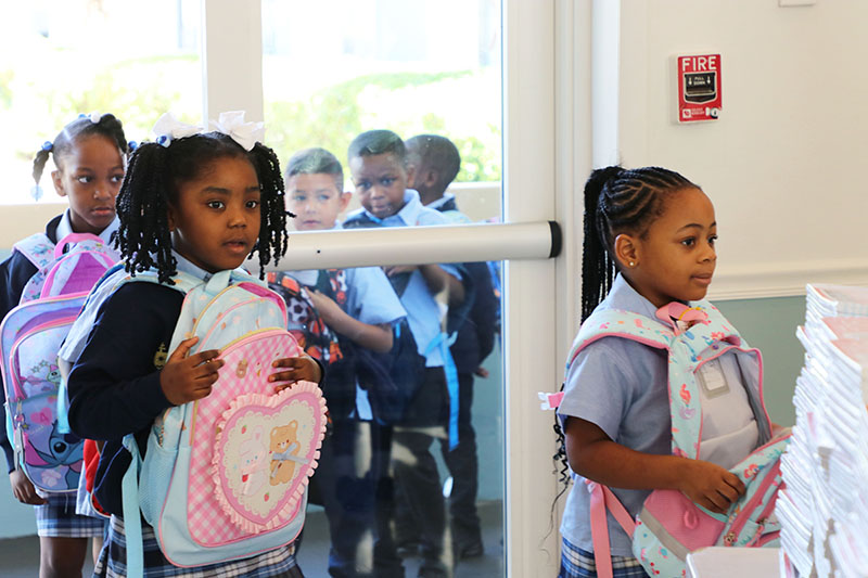 Students at St. Mary’s Cathedral School in Miami are excited to receive new school supplies Aug. 18, 2026. The Archdiocese of Miami was a sponsor for Kiwanis of Little Havana's Back-to-School Project, which provided school supplies for students in underprivileged communities this August.