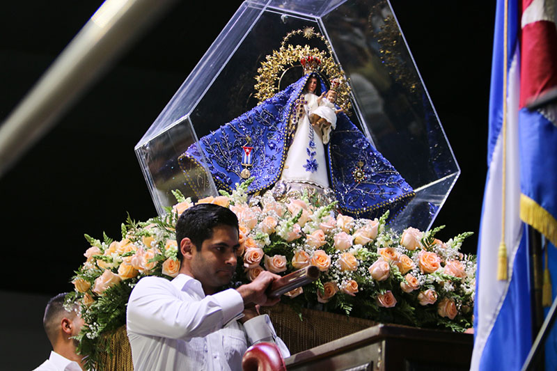 Volunteers proudly carry the statue of Our Lady of Charity during the Our Lady of Charity feast day celebration Sept. 8, 2026, at Miami-Dade Fair and Exposition.