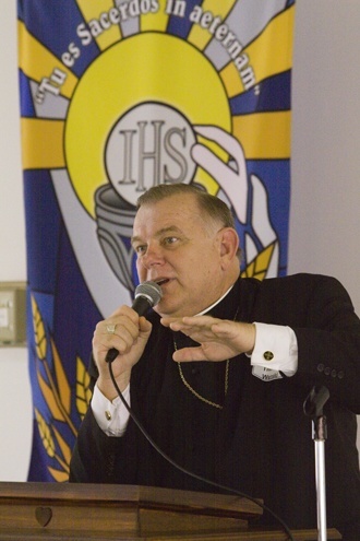 Archbishop Thomas Wenski speaks at a recent luncheon for retired priests.