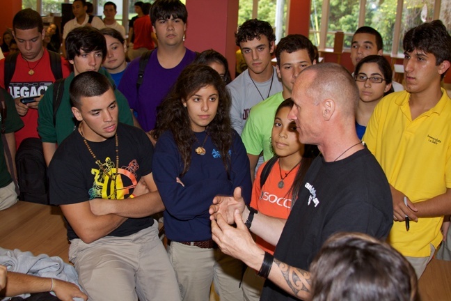 Students at Immaculata-La Salle High School in Miami listen intently to environmental activist Pete Bethune.
