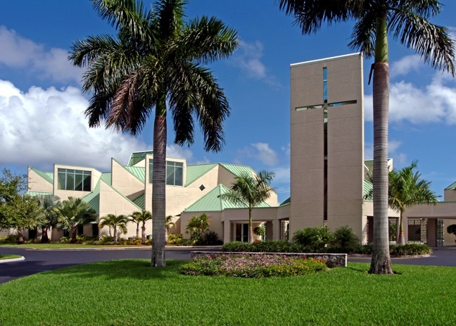 Exterior of Our Lady of the Holy Rosary's parish plant before the demolition. The church, on the left, with its multifaceted roof, had to be torn down as an unsafe structure.