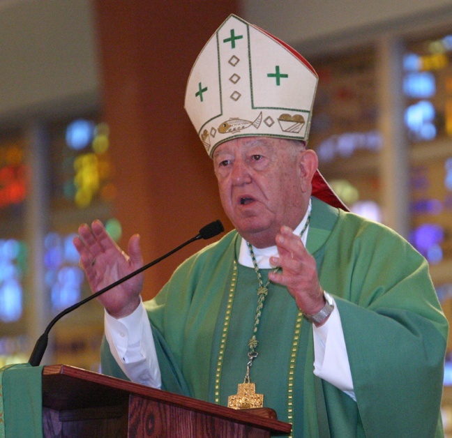 Archbishop John C. Favalora speaks to parishioners of Notre Dame d'Haiti Jan. 17. The archbishop told Haitians their suffering is not in vain. "Finally, finally, the focus of the world is on Haiti."