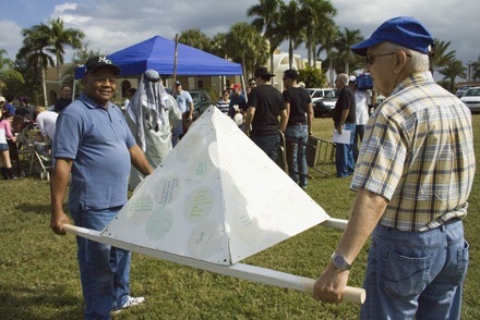Volunteers carry the pyramid through "the desert".