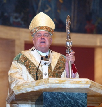 Archbishop Thomas Wenski preaches the homily at Christmas Mass at the Cathedral of St. Mary.