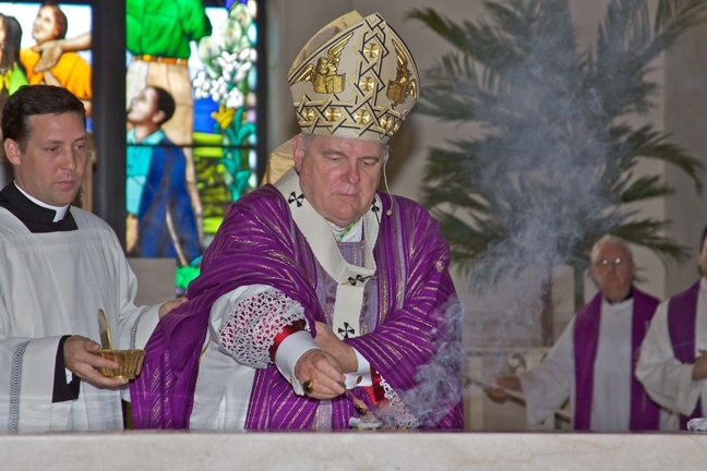 Archbishop Thomas Wenski blessed the altar by anointing it with holy oils first and then surrounding it with incense.