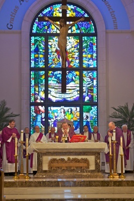 Among the renovations made to St. Gregory was the addition of the stain glass window depicting the Ascension and the altar made of Italian marble with the Last Supper depicted on the front facing the congregation.