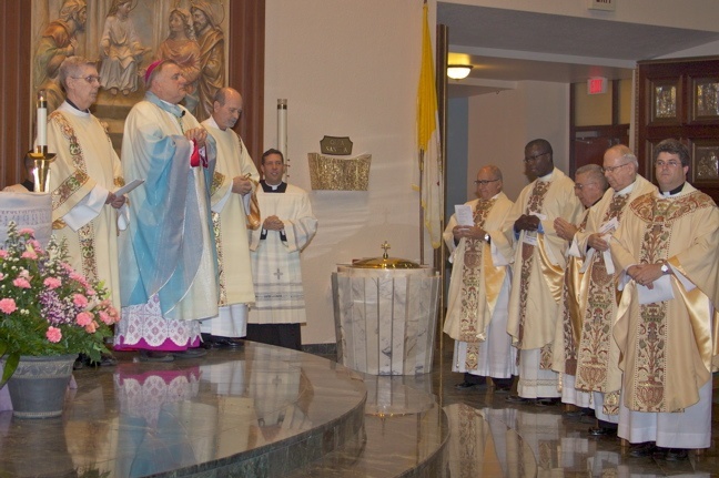 Archbishop Thomas Wenski celebrates a trilingual Mass in honor of the feast of the Immaculate Conception at Immaculate Conception Church in Hialeah.