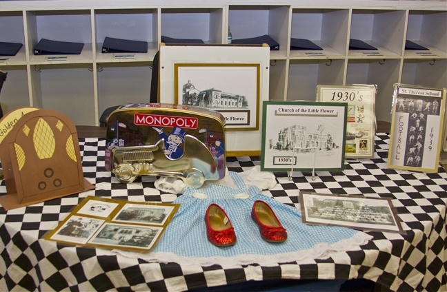 Students from each grade level decorated their classrooms to highlight the different decades during which St. Theresa School has been in existence. Music and memorabilia from the time abounded and yearbooks were on display.