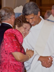 Consortia Medina hugs her son, Deacon Jesus 'Jets' Medina at the start of the ordination Mass.
