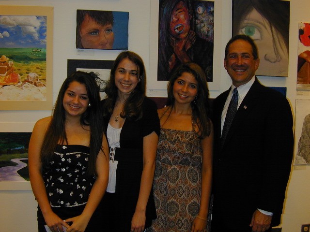 From left: Cardinal Gibbons High School students/exhibitors Jalin Rinderman, Melissa Usher and Francesca Champin join Congressman Ron Klein at the May 7 opening of "An Artistic Discovery: The Congressional Student Art Competition."