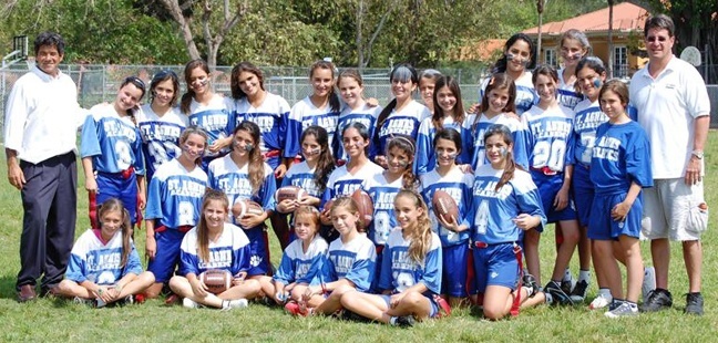 St. Agnes Academy girls� flag football team won their division for the third year in a row, with a record of 9 wins and 1 loss. Pictured are: top row from left: Coach Rod Bustamante, Ana Maria Alvarez, Cristina Weisson, Isa Prado, Mariella Norona, Viviana Du Pond, Ivanna Boehme, Daniella Lozano, Maria Perez-Hickman, Natalia Diaz, Andrea Luchsinger, Camila Rocha, Julia Batlle, Alexa Casale, Nicole Andrade, Manager Alexandra Robelo, and Coach Dan Rodriguez; kneeling from left: Michelle Galindez, Sofia Waterhouse, Josefina Moni, Sydney Galindez, Francesca Tavara, Celia Romero and Veronica Romanach; sitting from left: Sophia Polenghi, Isa Poleo, Clarissa Halvorssen, Manuela Guyot, and Camila Guyot.
