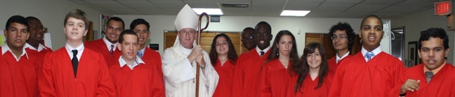 The confirmandi pose for a picture with Auxiliary Bishop John Noonan.